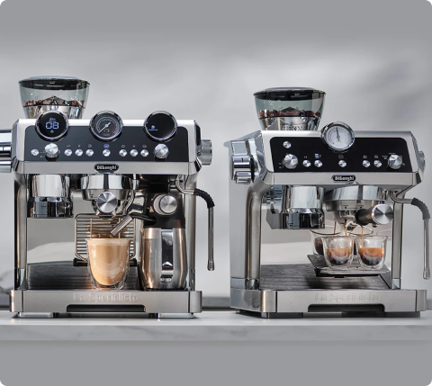 Coffee machine and cups on a counter
